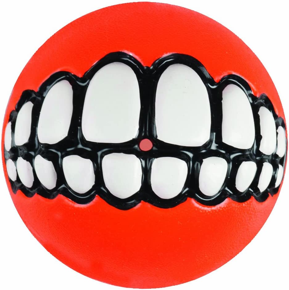  close-up image of Rogz Grinz Treat Ball Red, focusing on its texture, smiley face design, and treat-dispensing feature.