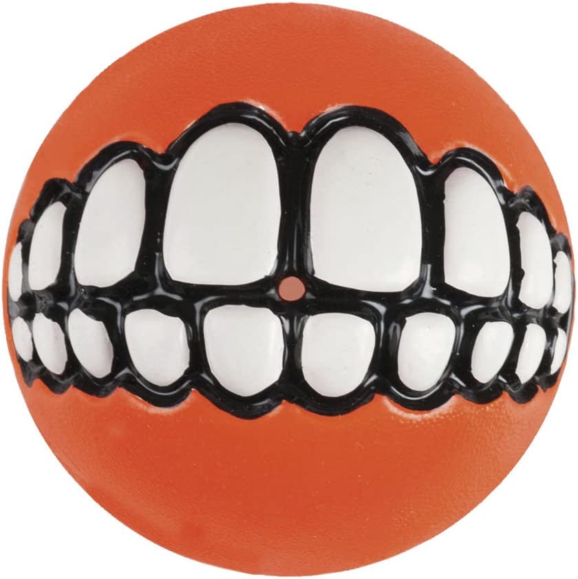 A close-up shot of the Rogz Grinz Treat Ball Orange, capturing its textured surface and the treat-dispensing opening.