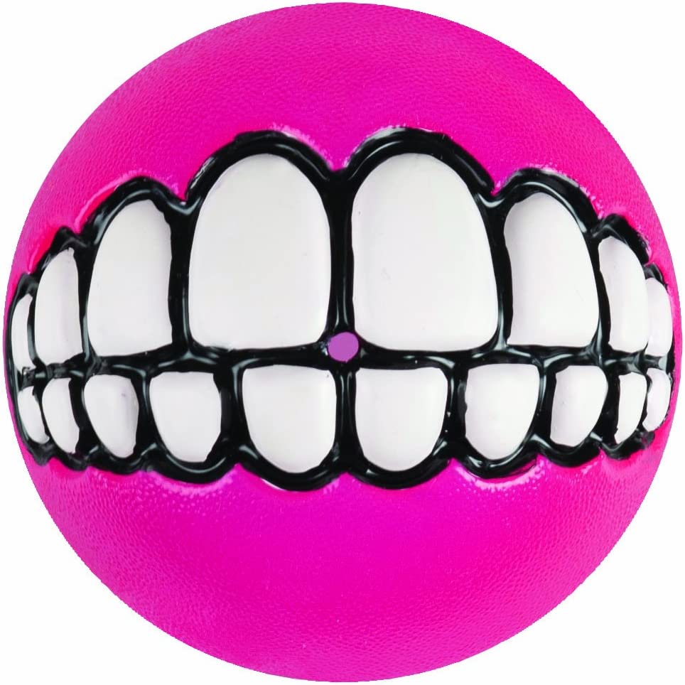 A close-up image of Rogz Grinz Treat Ball Pink, focusing on its texture, smiley face design, and treat-dispensing feature.